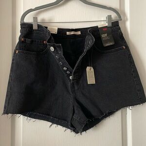 Levi’s black button fly ribcage shorts. 33
